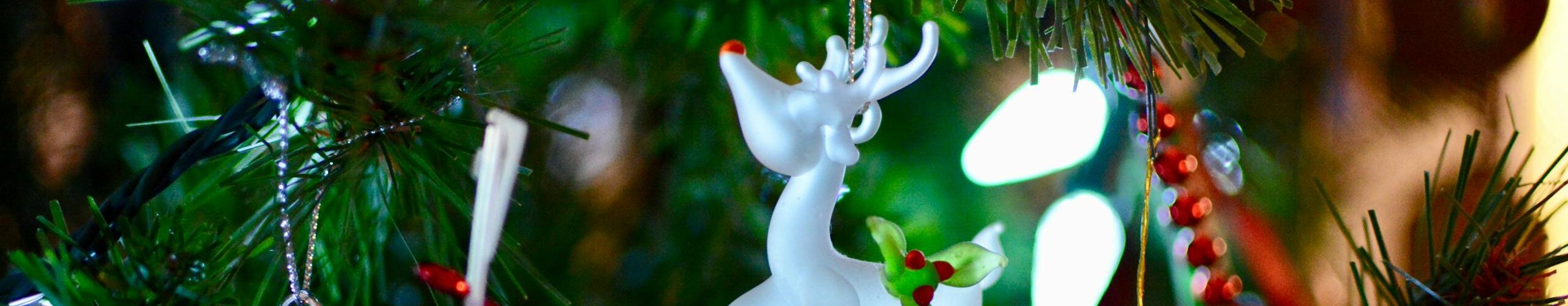 Shallow Focus Photography of White Deer Christmas Tree Ornament